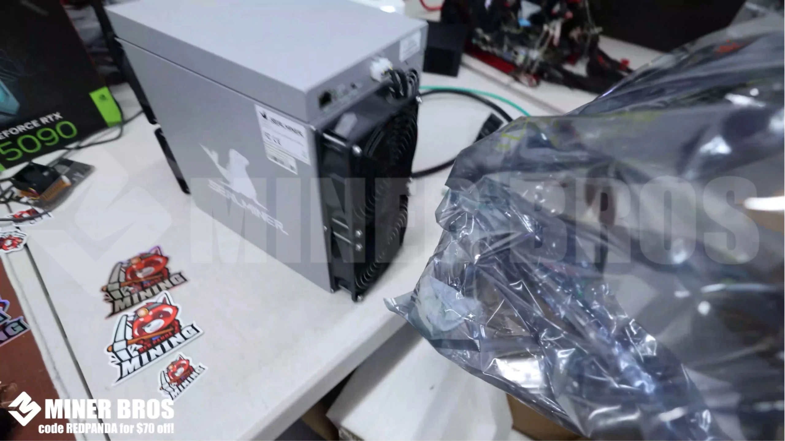 The ASIC miner is safely enclosed in an anti-static bag to protect it from physical or electrostatic damage.
