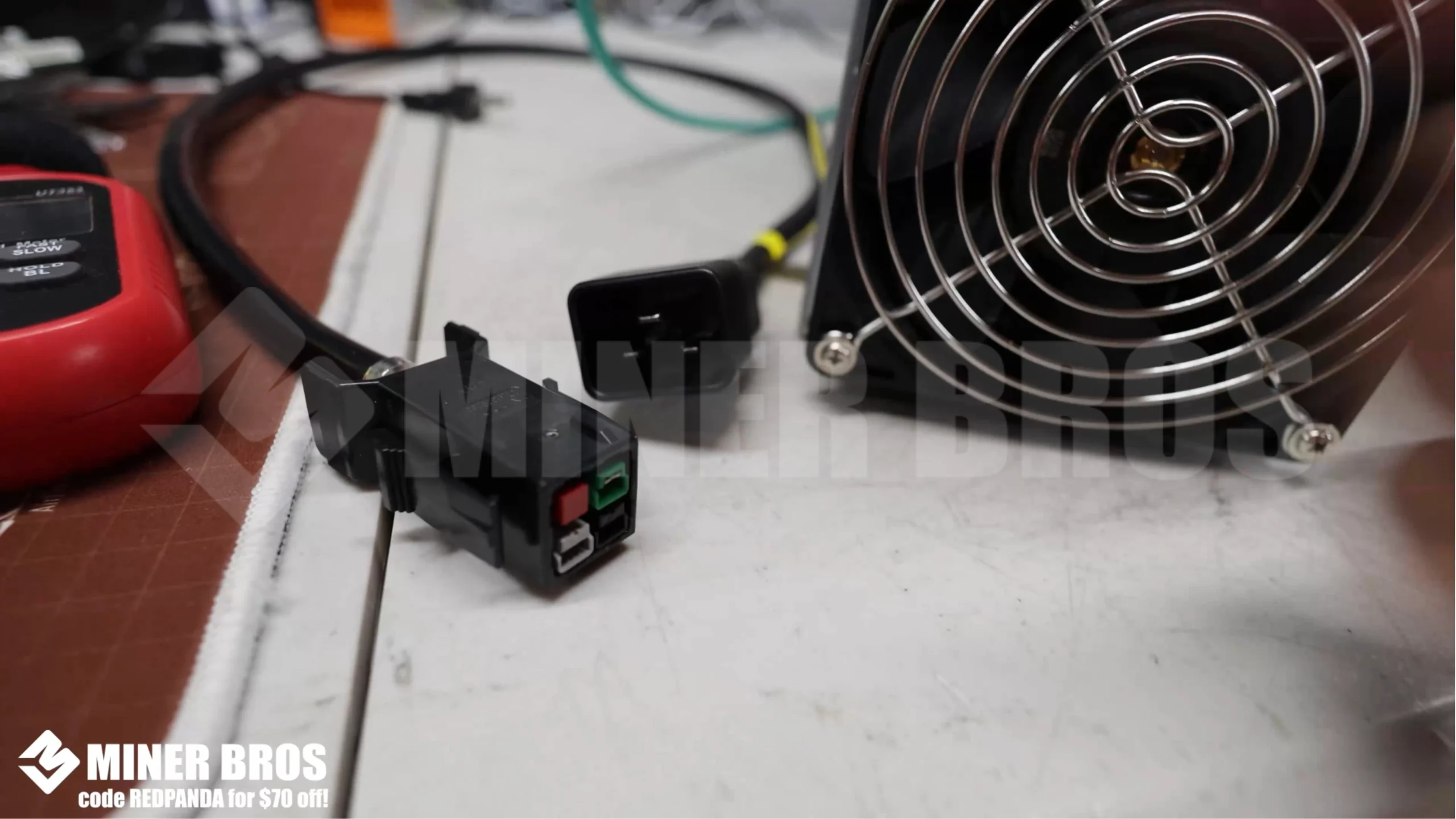 The DG2 uses a P13 to C20 power cable, with variations by region. - 3